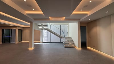 Camden Dr floating stone staircase and lower entertainment level, Beverly Hills
